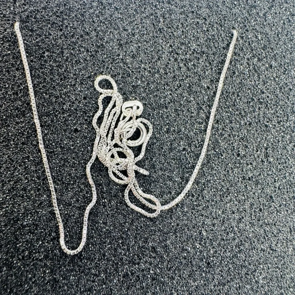 The Irish Store Sterling Silver and Half Pearl Trinity Knot Pendant with Chain